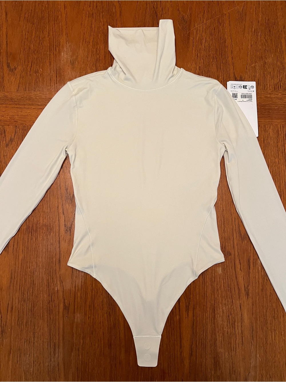 NWT Lululemon Wundermost Ultra-Soft Nulu Turtleneck Bodysuit; colorBone / Size S